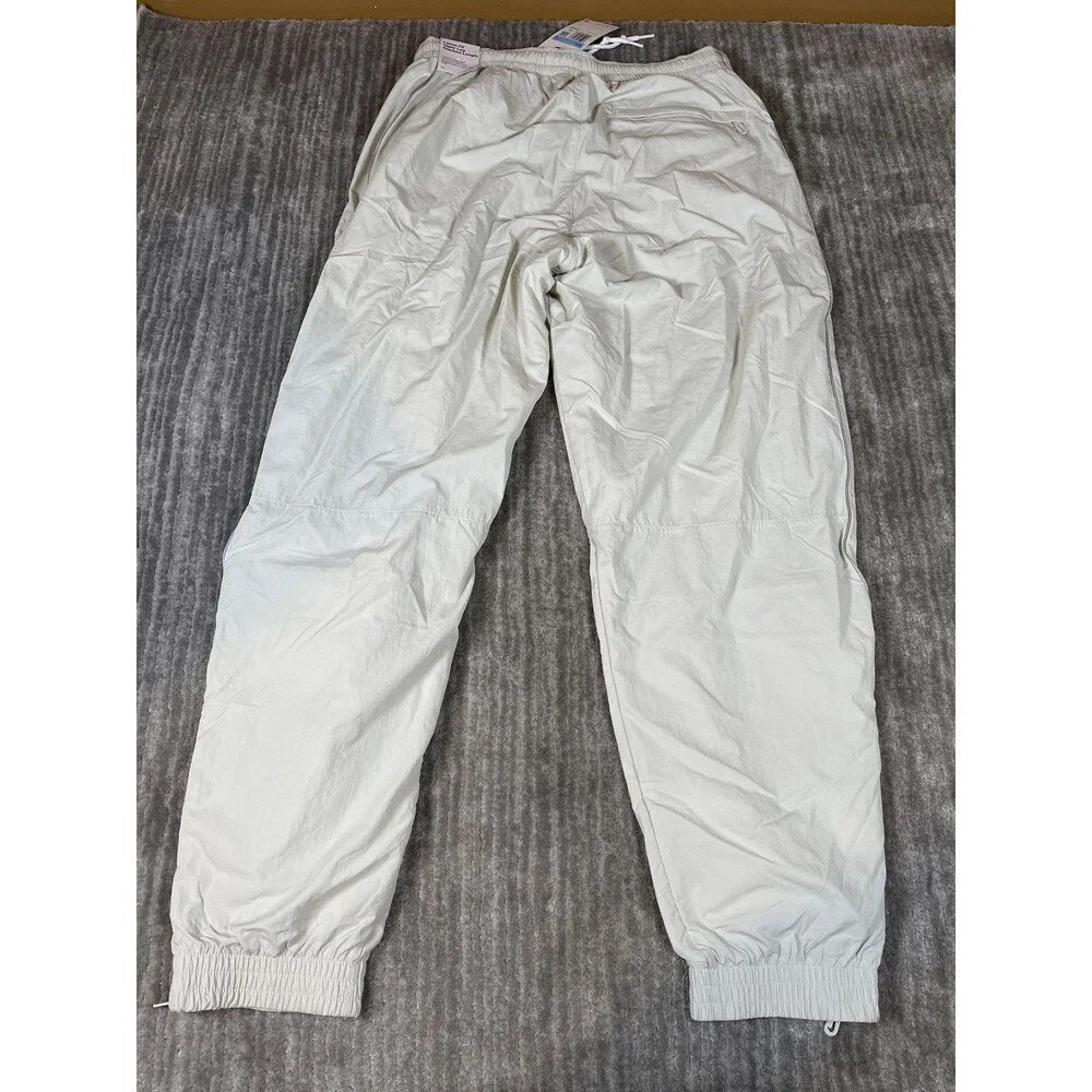 Nike Track Pants Mens Medium White Solo Swoosh Loose Fit Taper Leg Stacked New